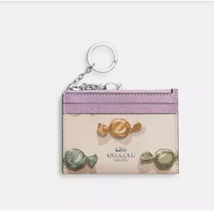 Mini Skinny Id Case With Candy Print And Charm